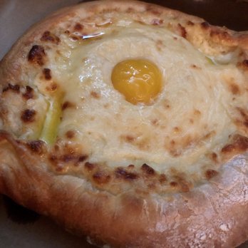 Skalka - Adjaruli. A delicious khachapuri with an egg on top. You won't want to eat Seattle pizza again after seeing how tender the bread is. - Breakfast & Brunch Near Me - Seattle, Washington Skalka - Adjaruli. A delicious khachapuri with an egg on top. You won't want to eat Seattle pizza again after seeing how tender the bread is. - Breakfast & Brunch Near Me - Seattle, Washington