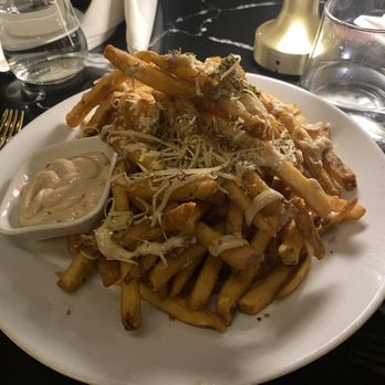 Bungalow Downtown Dining - Truffle fries appetizer - Steakhouses Near Me - Houston, Texas Bungalow Downtown Dining - Truffle fries appetizer - Steakhouses Near Me - Houston, Texas