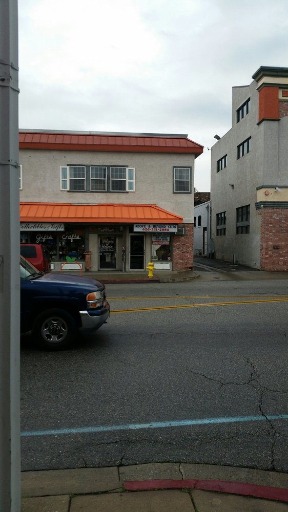 Above & Beyond Cuts Logo