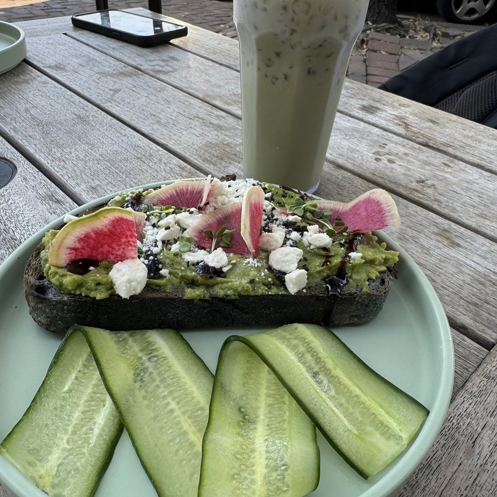 Origin Coffee Bar - Avocado toast with charcoal sourdough and iced matcha - Coffee & Tea Near Me - Savannah, Georgia