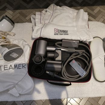 EXchange Hotel Vancouver - Dyson's hair dryer, steamer, slippers, and robes inside the bathroom. - Hotels Near Me - Vancouver, British Columbia EXchange Hotel Vancouver - Dyson's hair dryer, steamer, slippers, and robes inside the bathroom. - Hotels Near Me - Vancouver, British Columbia