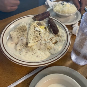 Sharon's Homestyle Cookin' - Biscuits and gravy grits sausage eggs. - Southern Near Me - Pine Castle, Florida
