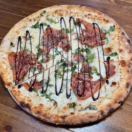 "Chef Special" (pecorino cream, fior di latte, mozzarella, arugula, prosciutto, balsamic glaze, grana padano) "Chef Special" (pecorino cream, fior di latte, mozzarella, arugula, prosciutto, balsamic glaze, grana padano)