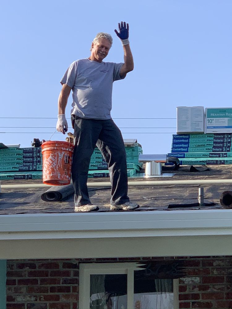 Slide of Signature Roofing