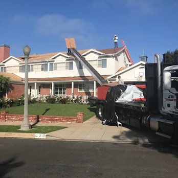 Roofing Contractors Inc - roof loading with flatbed conveyor truck 1 - Roofing Near Me - Northridge, California Roofing Contractors Inc - roof loading with flatbed conveyor truck 1 - Roofing Near Me - Northridge, California