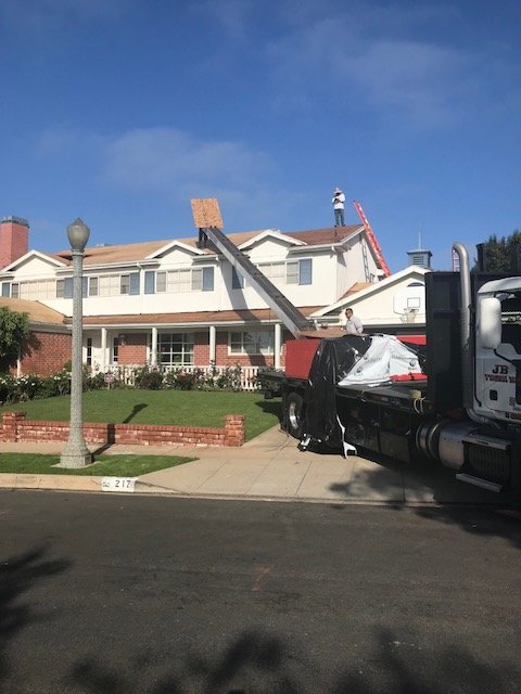 Slide of Roofing Contractors Inc