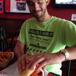 Mister Ps Buffalo Wings Plus - My son and his hotdog, bacon burger.