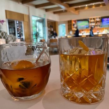 Michael Mina - Sarsaparilla Manhattan $23 (LEFT) & Classic Old Fashioned w/ Bulleit Rye $28 (RIGHT) - New American Near Me - Las Vegas, Nevada Michael Mina - Sarsaparilla Manhattan $23 (LEFT) & Classic Old Fashioned w/ Bulleit Rye $28 (RIGHT) - New American Near Me - Las Vegas, Nevada