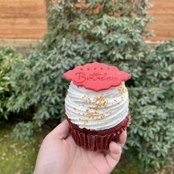 The Clever Cupcakes - Dairy free big cupcake - red velvet with vanilla icing, gold sprinkles and red happy birthday plaque.