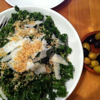UNA Pizza + Wine - 17th Ave - Kale salad and olive appetizer - Pizza Near Me - Calgary, Alberta UNA Pizza + Wine - 17th Ave - Kale salad and olive appetizer - Pizza Near Me - Calgary, Alberta