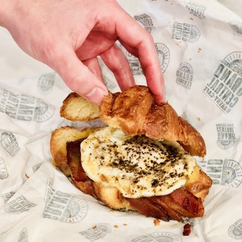Grand Central Bakery - Fried Egg Croissant Sandwich with Bacon and Cheddar - Bakeries Near Me - Portland, Oregon Grand Central Bakery - Fried Egg Croissant Sandwich with Bacon and Cheddar - Bakeries Near Me - Portland, Oregon