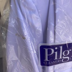 Pilgrim Dry Cleaners - Stain on left arm that wasn't cleaned.