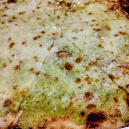 Seasonal Special - Spring Onion Pizza: mozzarella, wild spring onion pesto, pine nuts, pecorino romano Seasonal Special - Spring Onion Pizza: mozzarella, wild spring onion pesto, pine nuts, pecorino romano