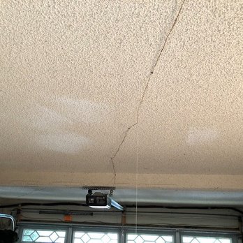 All Pro Electric - BEFORE: Just a dim garage door light overhead, with random wiring. - Electricians Near Me All Pro Electric - BEFORE: Just a dim garage door light overhead, with random wiring. - Electricians Near Me