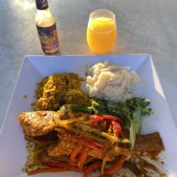 Whole Snapper, seasoned rice, broccoli and roasted garlic mash.