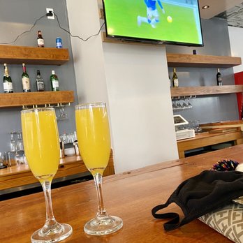 Lux Cafe - Bar area, free mimosas every Saturday and Sunday!! - Breakfast & Brunch Near Me - New Orleans, Louisiana