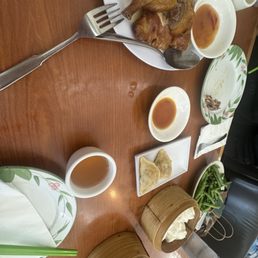 Duck, steamed buns, green beans, pot stickers, wrap Duck, steamed buns, green beans, pot stickers, wrap
