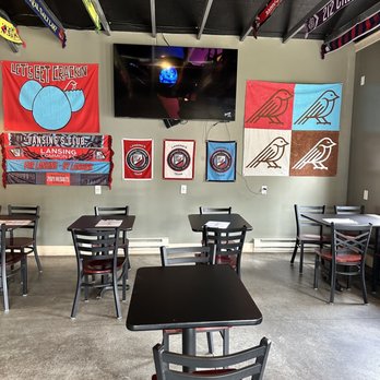 Ozone's Brewhouse - tables and chairs in a restaurant - Breweries Near Me - Lansing, Michigan