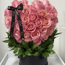 Vivis flower market  - Hermosa Roses creating a heart box arrangement.
