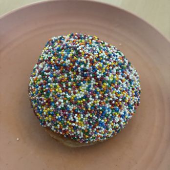 Sunday Morning Bakehouse - Funfetti donut covered in sprinkles - Coffee & Tea Near Me - McLean, Virginia