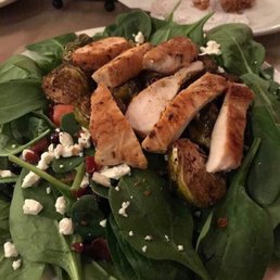 So much in every bite; cucumber, tomato, onion, feta cheese, cranberries, grapes, roasted brussel sprouts, and chicken! Yum!