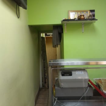 Janani Restaurant - The bathroom is down this hallway - Indian Near Me - Montreal, Quebec Janani Restaurant - The bathroom is down this hallway - Indian Near Me - Montreal, Quebec