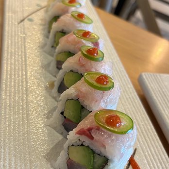 Naamah Sushi - a row of sushi rolls - Sushi Bars Near Me - Boca Raton, Florida Naamah Sushi - a row of sushi rolls - Sushi Bars Near Me - Boca Raton, Florida