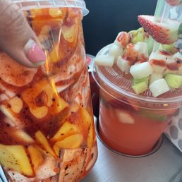 Fruit cup (Vaso de fruta) with coconut and mango. Strawberry lemonade topped with fruit Fruit cup (Vaso de fruta) with coconut and mango. Strawberry lemonade topped with fruit