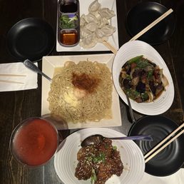 Dragon wings, shrimp garlic noodles, basil eggplant, pork chive dumplings, dragon cosmo Dragon wings, shrimp garlic noodles, basil eggplant, pork chive dumplings, dragon cosmo