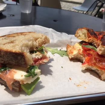 Pitango Bakery Cafe - Left: prosciutto, avo, arugula, tom, mozz, & cheese spread country wheat. Right: tom focaccia, roasted tom, mozz, basil&eggplant - Cafes Near Me - Baltimore, Maryland