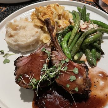 Flint Kitchen & Bar - Lamb lollipops, green bean almondine, mac and cheese and mashed potatoes. - New American Near Me - Oklahoma City, Oklahoma