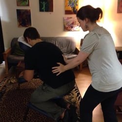The Art Of Massage - Enjoying a relaxing chair massage