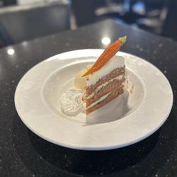 Flat Top Bar and Grill - Carrot cake with one scoop, vanilla bean ice cream