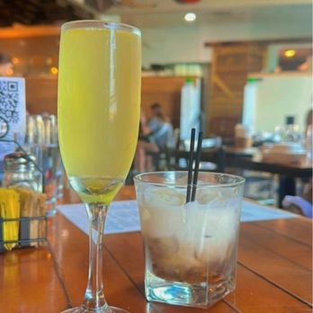 The Creamery Downtown - Passion fruit mimosa and Russian Joe - Cafes Near Me - Green Bay, Wisconsin