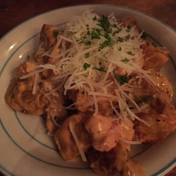 Santiago's Bodega - Patatas Bravas - Well, it's more like a spicy mayo sauce. I couldn't taste the Gouda, but I loved the capers. - Tapas Bars Near Me - Key West, Florida