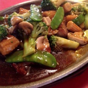 Wing On Inn - Sizzling steak served on a hot plate. Steak with broccoli, mushrooms, pea pods, and water chestnuts. - Chinese Near Me - Anderson, Indiana Wing On Inn - Sizzling steak served on a hot plate. Steak with broccoli, mushrooms, pea pods, and water chestnuts. - Chinese Near Me - Anderson, Indiana
