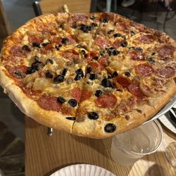 Another Slice - Build your own pizza: carmelized onions, black olives, pepperoni, and sausage
