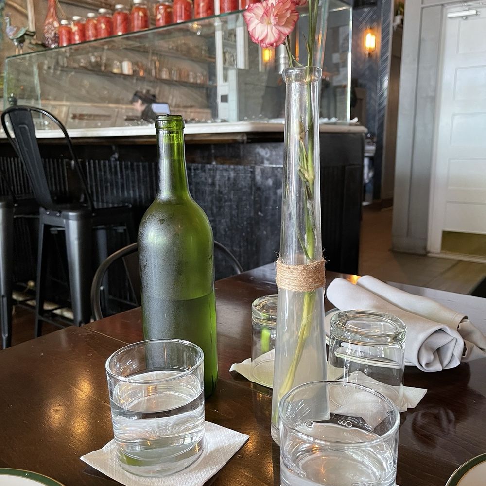 C King & Cafe - glass of water and a bottle on a table - Pizza Near Me - Ypsilanti, Michigan C King & Cafe - glass of water and a bottle on a table - Pizza Near Me - Ypsilanti, Michigan