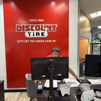 Discount Tire - Jon O working hard to provide excellent service for a customer! - Wheel & Rim Repair Near Me - Boerne, Texas