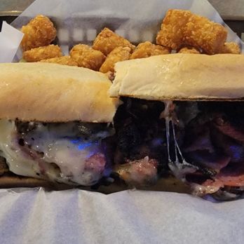 Famous Sam's - The 'stuffed' pastrami sandwich that wasn't stuffed & very salty. - Sports Bars Near Me - Tucson, Arizona Famous Sam's - The 'stuffed' pastrami sandwich that wasn't stuffed & very salty. - Sports Bars Near Me - Tucson, Arizona