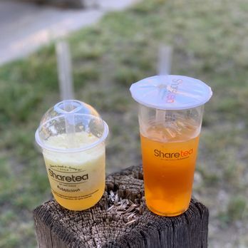 Sharetea - two drinks sitting on a tree stump - Coffee & Tea Near Me - Fullerton, California