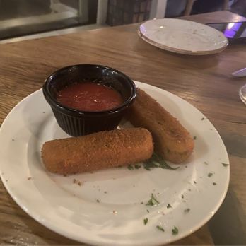 IL Nido - Bastoncini di Mozzarella (mozzarella sticks). It comes with four, but I had already eaten two before I remembered to take a picture. - Sicilian Near Me - Sherman Oaks, California IL Nido - Bastoncini di Mozzarella (mozzarella sticks). It comes with four, but I had already eaten two before I remembered to take a picture. - Sicilian Near Me - Sherman Oaks, California