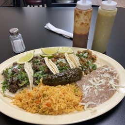 2 asada taco, 2 al pastor tacos, rice & beans. 2 asada taco, 2 al pastor tacos, rice & beans.