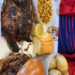 Carrubba's Chicken Pit - Hungry man's platter with Cajun corn and spuds