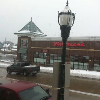 Walgreens - a red car parked in front of a store - Drugstores Near Me - West Allis, Wisconsin Walgreens - a red car parked in front of a store - Drugstores Near Me - West Allis, Wisconsin
