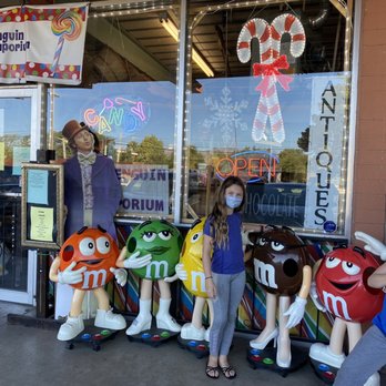 Purple Penguin Candy Emporium - a group of people posing in front of a store - Candy Stores Near Me - Tucson, Arizona Purple Penguin Candy Emporium - a group of people posing in front of a store - Candy Stores Near Me - Tucson, Arizona