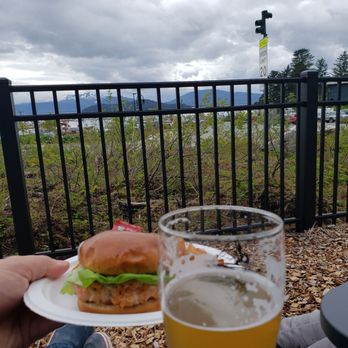 Forbidden Peak Brewery - Salmon burger fro. Red spruce (inside brewery) and a strawberry lime beer. - Breweries Near Me - Juneau, Alaska