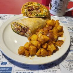 Mimis Diner - Breakfast Burrito....scrambled eggs, bacon, peppers, onions & salsa