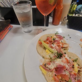 Neon Fig - 2 breakfast tacos (2 shown) with the Hibiscus Sparkler - Bars Near Me - Aiken, South Carolina Neon Fig - 2 breakfast tacos (2 shown) with the Hibiscus Sparkler - Bars Near Me - Aiken, South Carolina