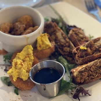 Miss Toya's - Three appetizer platter; $30. Fried deviled eggs (great), hot honey Salmon bites (not great), jerk chicken rolls (uggg) - Southern Near Me - Gambrills, Maryland Miss Toya's - Three appetizer platter; $30. Fried deviled eggs (great), hot honey Salmon bites (not great), jerk chicken rolls (uggg) - Southern Near Me - Gambrills, Maryland